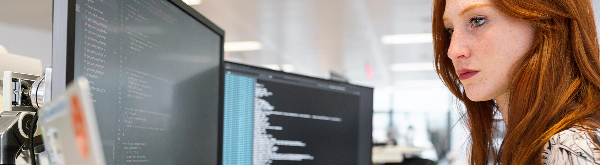 image of woman coding a website